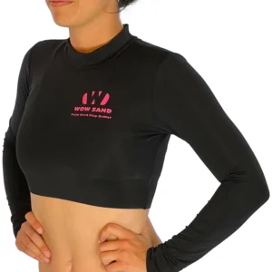 Black long sleeve sports crop top by WOW Sand with +50 SPF for beach volleyball athletes.