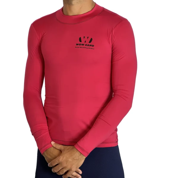 Close-up of a WOW Sand Watermelon Long Sleeve t-shirt showcasing the brand logo
