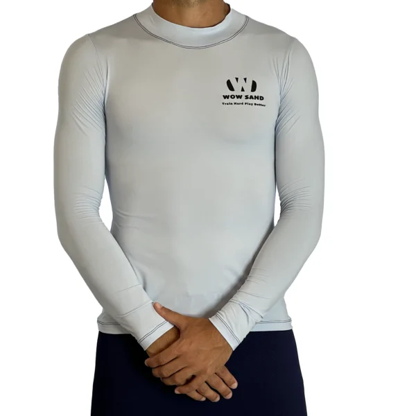 Close-up of a WOW Sand Ice Blue Long Sleeve t-shirt showcasing the brand logo