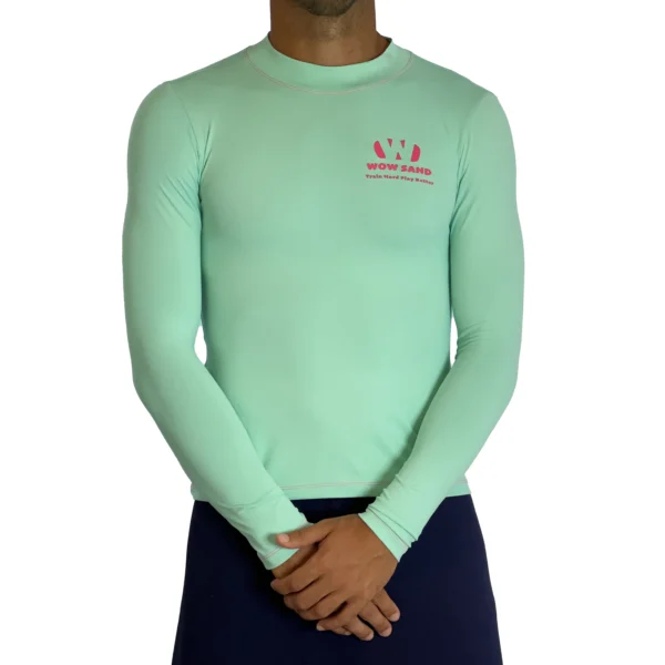 Close-up of a WOW Sand Seafoam Long Sleeve t-shirt showcasing the brand logo