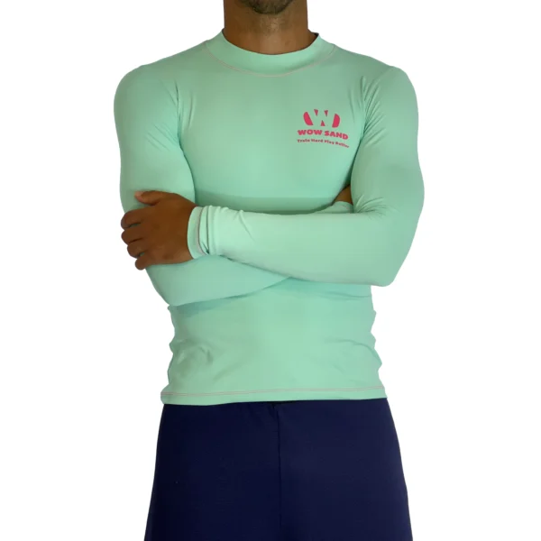 Close-up of a WOW Sand Seafoam Long Sleeve t-shirt showcasing the brand logo