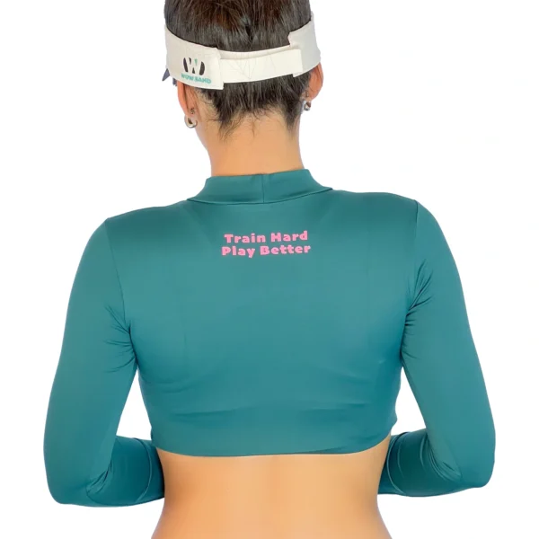 WOW Sand’s Arabian green long sleeve crop top for comfortable sand volleyball play.