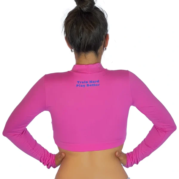 Pink crop top with long sleeves by WOW Sand, ideal for sand volleyball and outdoor sports.